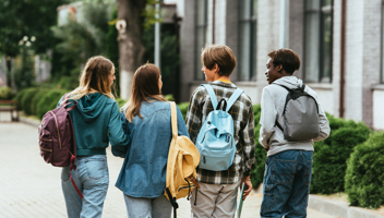 42823854 Back View Of Multiethnic Teenagers With Backpacks (1)