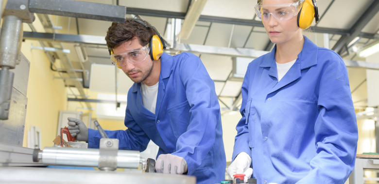 60949608 Young Metallurgists At Work In School Workshop