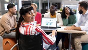 55506434 Smiling Biracial Disabled Businesswoman Looking Over